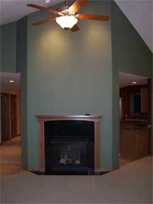 unique fireplace with wood mantel