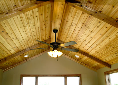custom wood plank ceiling in sunroom